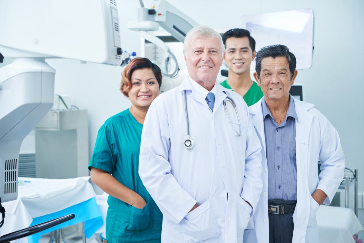 Smiling group of doctors and surgeons