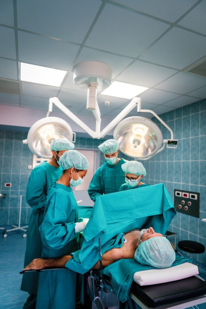 Surgery team operating in a surgical room